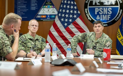 Chief of Naval Operations Adm. Daryl Caudle meets with Capt. JD Crinklaw, commander, Puget Sound Naval Shipyard & Intermediate Maintenance Facility, and senior leadership during his command visit, June 3, 2026, in Bremerton, Washington. The team discussed several key initiatives during the visit. (U.S. Navy photo by Wendy Hallmark)