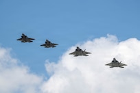 An F-22 Raptor from the Virginia Air National Guard’s 192nd Fighter Wing flies alongside a Finnish Air Force F-35 Lightning II at Ebbing Air National Guard Base, Arkansas, June 16, 2026.