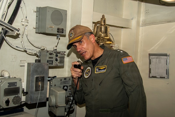 Rear Adm. Carlos Sardiello, commander of U.S. Naval Forces Southern Command/ U.S. 4th Fleet, speaks to the crew of Nimitz-class aircraft carrier USS Nimitz (CVN 68) over the ship’s 1MC following Nimitz’ arrival at Naval Station Mayport in Jacksonville, Florida, June 16, 2026. Nimitz is underway in the U.S. 2nd Fleet Area of Operations as part of a scheduled homeport shift to Norfolk, Virginia. (U.S. Navy Photo by Mass Communication Specialist Seaman Apprentice Molly Guy)
