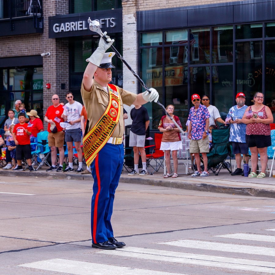 U.S. Marine Corps Cpl. Tyren Davis, a musician with the Quantico Marine Brass Band performs during the post-parade patriotic concert in Appleton, Wisconsin, June 13, 2026. The annual Flag Day Parade is referred to as one of the oldest, largest, Flag Day Parades in the nation with 50,000 patriotic attendees and is led by Marine Forces Reserve Color Guard, Marine Poolees from Recruiting Sub Station Appleton, and the Quantico Marine Band. (U.S. Marine Corps photo by Lance Cpl. Lynsee Avila-Ramirez)
