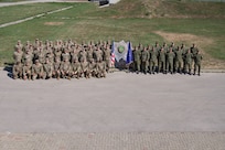 Iowa Air National Guard communication Soldiers and Airmen pose for a group photo alongside Kosovo Security Force communications soldiers during Exercise Sentinel Sica in Kosovo, June 11, 2026.