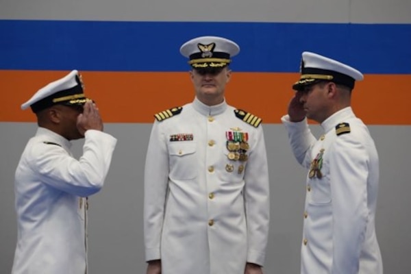 From left: Capt. (sel) Justin Smith, Capt. Andrew Meverden and Cmdr. Nathaniel Dufresne during the In-Service Vessel Sustainment Project Resident Office Baltimore change of command ceremony June 4, 2026. U.S. Coast Guard photo