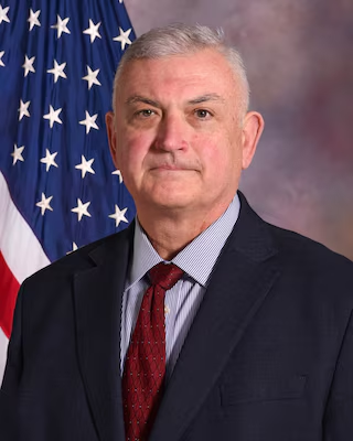 Brian J. Mansfield, Interim Chancellor