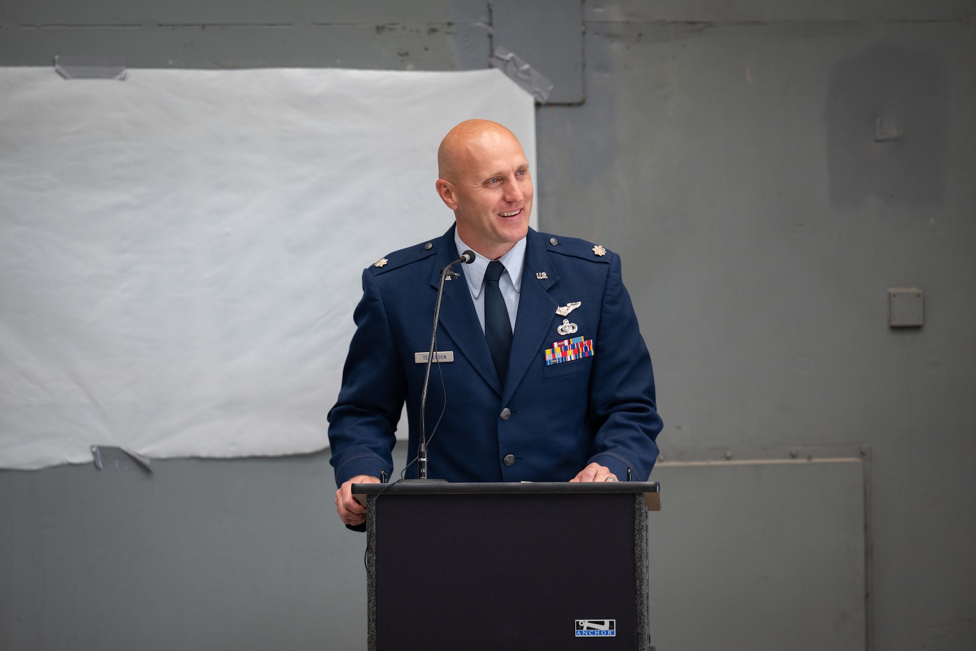 Lt. Col. Jonathan Tellefsen addresses attendees on hand to see him assume the role of 717th Test Squadron commander during a June 9, 2026, Change of Leadership ceremony at Arnold Air Force Base, Tenn., headquarters of Arnold Engineering Development Complex. Prior to assuming the role of 717 TS Commander, Tellefsen served as Director of Operations for the 715th Test Squadron. (U.S. Air Force photo by Keith Thornburgh)