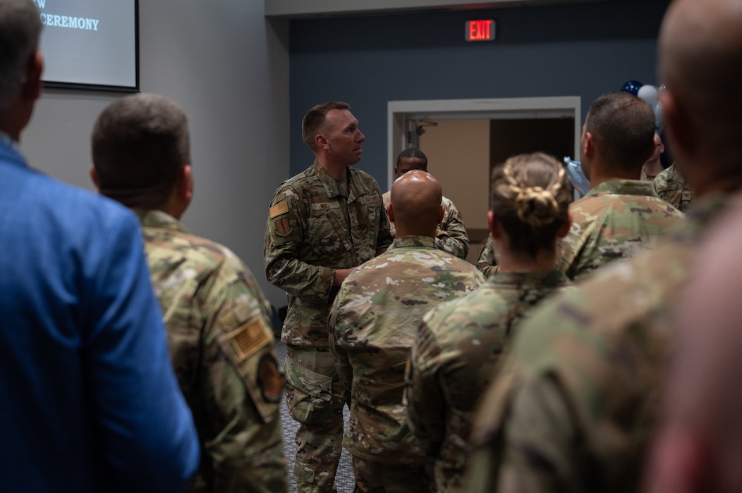 U.S. Air Force Chief Master Sgt. Derek Neill, 17th Training Wing command chief, addresses the new master sergeant selects during a master sergeant release party at the Powell Event Center, Goodfellow Air Force Base, Texas, June 16, 2026. Master sergeants serve as leaders and mentors to junior Airmen and noncommissioned officers, sharing the lessons they've learned throughout their careers. (U.S. Air Force photo by Senior Airman Brian Lummus)