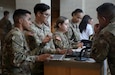 Soldiers from both the 35th Expeditionary Signal Brigade – Enhanced, 1st Mission Support Command and the 312th Adjutant General Company, 311th Sustainment Command (Expeditionary) conduct Reception, Staging, Onward Movement, and Integration (RSOI) operations using the Tactical Personnel System during Operation Sentinel Justice at Camp Shelby, Mississippi, June 10. 2026. TPS is an automated tactical strength management system that provides the field with an application that can serve as a deployment-manifesting platform for anyone issued a Common Access Card (CAC), including military personnel, civilians (DoD Civilians and Contractors), and Foreign Nationals. 

OSJ is the largest training event in the history of the Army Reserve, with an estimated 12,000-15,000 Soldiers participating. The training event is comprised of Combat Support Training Exercise (CSTX) 26-01, Global Medic, and a Tech Evaluation (TECH EVAL) spread across Camp Shelby, MS, Camp Beauregard, LA, & Gulfport, MS. The CSTX is designed to assess and enhance the readiness and capabilities of Army Reserve Soldiers in a modern, dynamic, multi-echelon, and joint operational environment aimed at preparing the force for Large Scale Combat Operations (LSC0). (U.S. Army photo by Sgt. 1st Class Rodney Roldan)