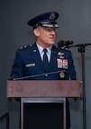 A man in uniform stands at a podium and gives a speech.