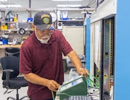 Engineer Technician, Felix Moreno prepares the M41 Protective Assessment Test System (PATS). The M41 PATS is a vital tool utilized by chemical, biological, radiological and nuclear specialists to ensure the integrity and life-saving seal of Soldiers' protective masks.