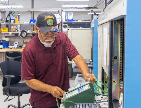 Engineer Technician, Felix Moreno prepares the M41 Protective Assessment Test System (PATS). The M41 PATS is a vital tool utilized by chemical, biological, radiological and nuclear specialists to ensure the integrity and life-saving seal of Soldiers' protective masks.