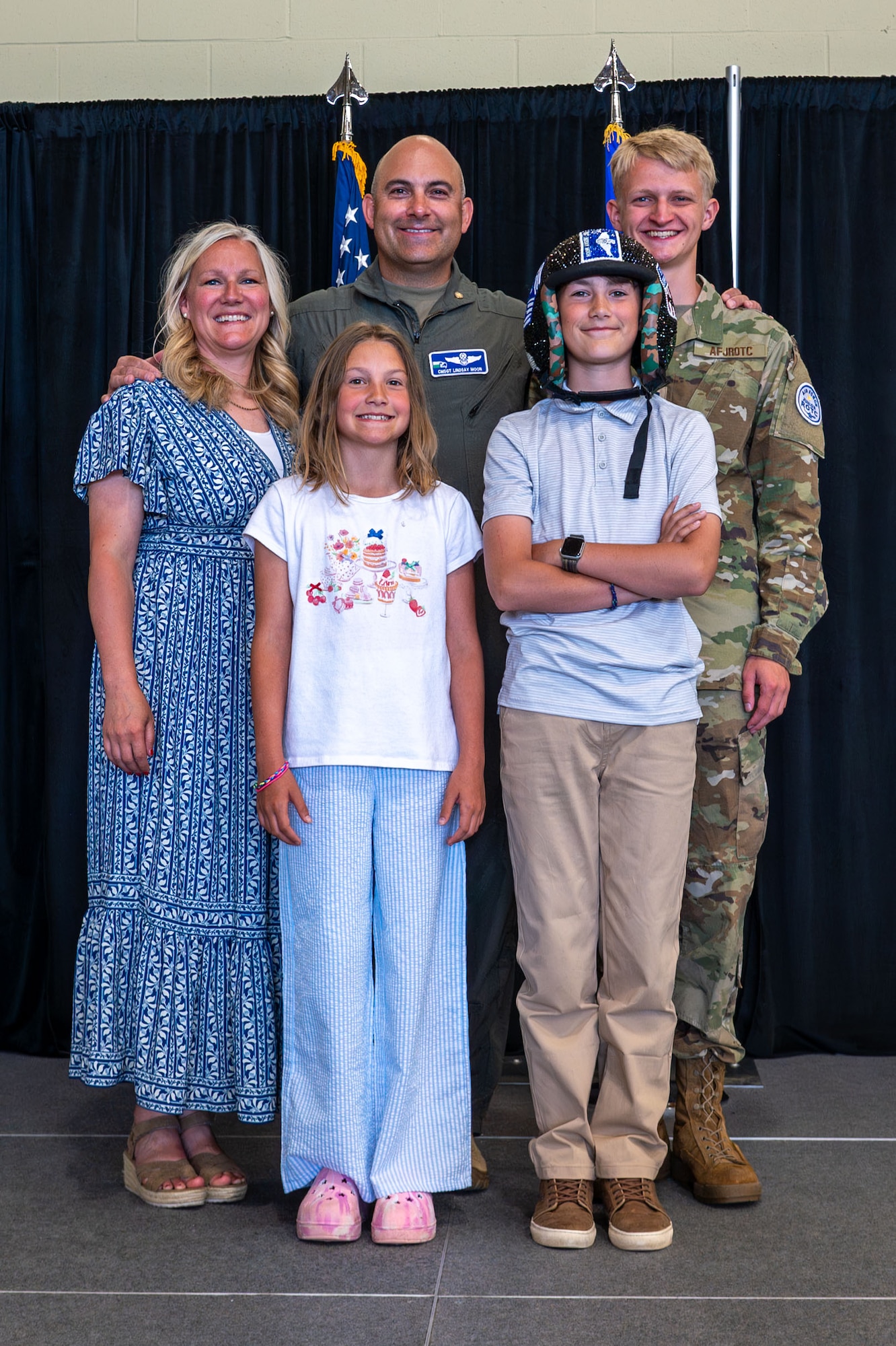 U.S. Air Force Chief Master Sgt. Lindsay Moon, former 92nd Air Refueling Wing command chief, and family gather for a group photo during his retirement ceremony at Fairchild Air Force Base, Washington, June 16, 2026.