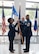 Chief Master Sgt. Marcus D. Washington, outgoing command chief of the 59th Medical Wing, passes the guidon to Brig. Gen. Gwendolyn A. Foster, commander of the 59th Medical Wing, during a Change of Responsibility Ceremony at the Wilford Hall Ambulatory Surgical Center, Joint Base San Antonio-Lackland, Texas, June 12, 2026.