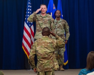 U.S. Air Force Lt. Col. Chris Bahrij, 13th Combat Air Base Squadron commander, renders a final salute to Senior Master Sgt. Olufemi Owolabi, 13th CABS first sergeant, during the unit's inactivation ceremony at Luke Air Force Base, Arizona, June 16, 2026.