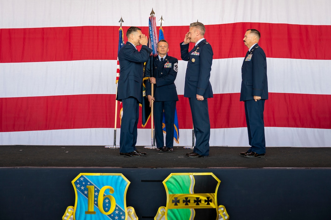 U.S. Air Force Lt. Gen. Thomas Hensley, commander of the Sixteenth Air Force salutes Col. Keagan McLeese, 9th Reconnaissance Wing commander, during the 9th RW change of command ceremony at Beale Air Force Base, California, June 17, 2026.