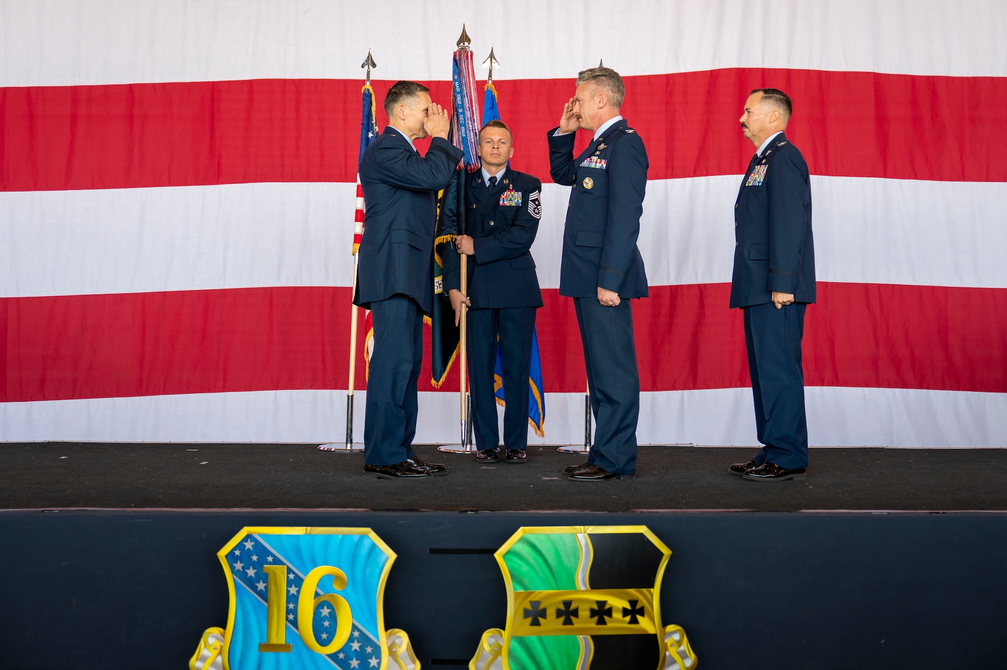 U.S. Air Force Lt. Gen. Thomas Hensley, commander of the Sixteenth Air Force salutes Col. Keagan McLeese, 9th Reconnaissance Wing commander, during the 9th RW change of command ceremony at Beale Air Force Base, California, June 17, 2026.