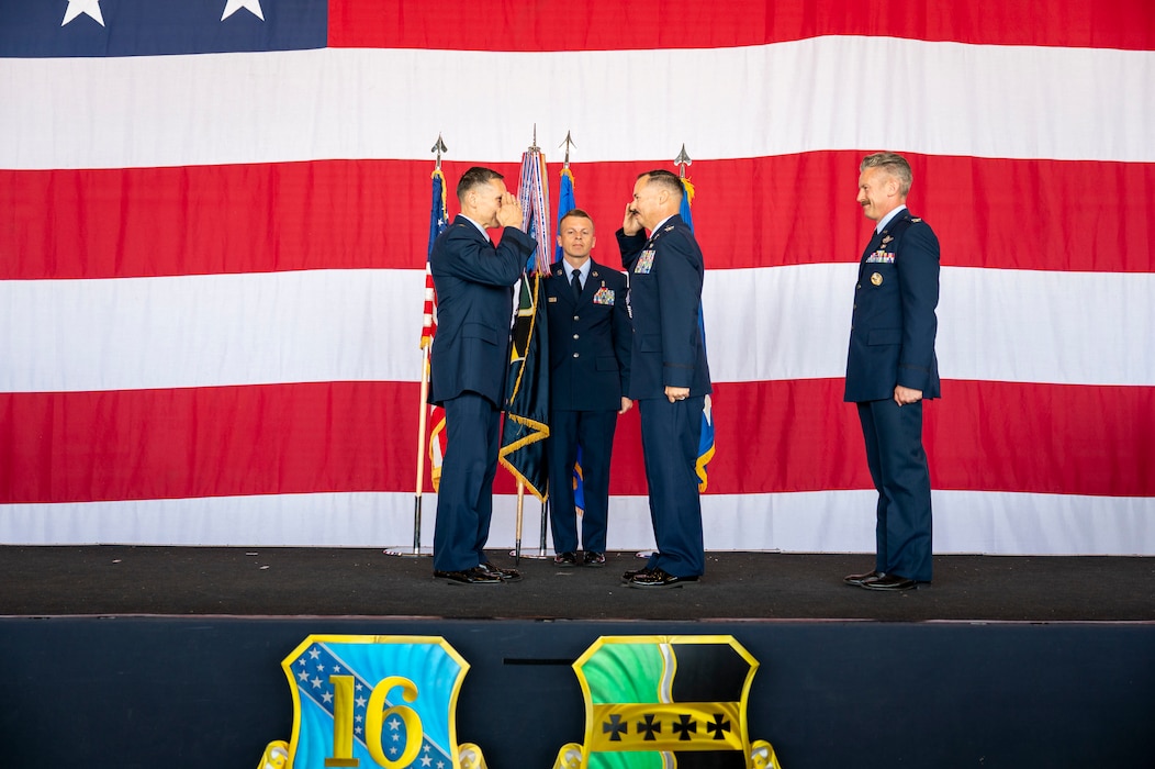 U.S. Air Force Lt. Gen. Thomas Hensley, commander of the Sixteenth Air Force, exchanges salutes Col. Geoffrey Cameron, 9th Reconnaissance Wing incoming commander, during the 9th RW change of command ceremony at Beale Air Force Base, California, June 17, 2026.