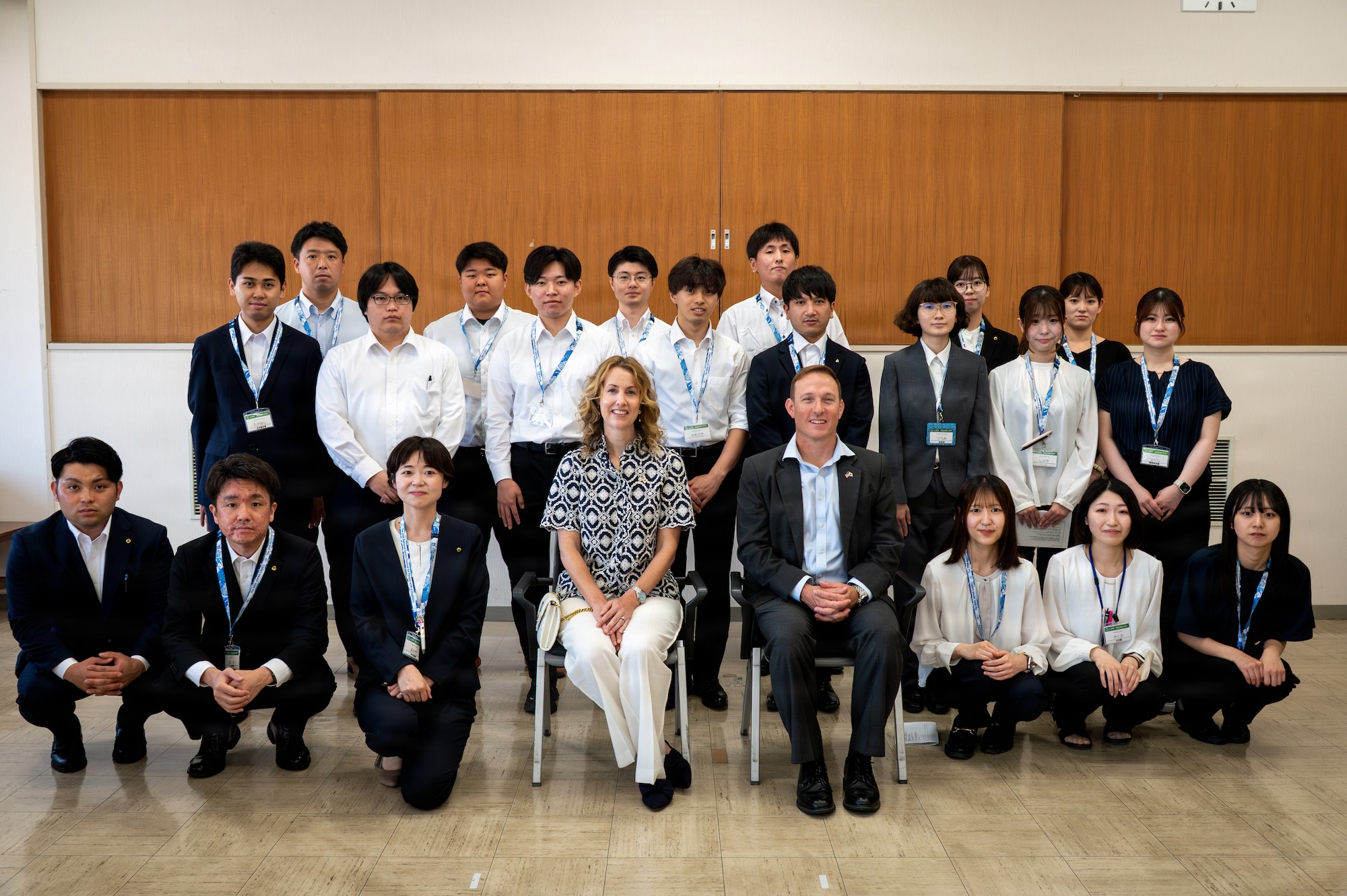 U.S. Air Force Col. Paul Davidson, 35th Fighter Wing commander, and his wife Megan Davidson, honorary Ambassador, pose for a group photo with newcomer employees of Misawa City Hall at Misawa, Japan, Jun 16, 2026.