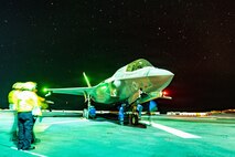 A U.S. Marine Corps F-35B Lightning II assigned to Marine Fighter Attack Squadron (VMFA) 122, 11th Marine Expeditionary Unit, is staged on the flight deck aboard Wasp-class amphibious assault ship USS Boxer (LHD 4) in the South China Sea, June 13, 2026.