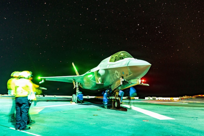 A U.S. Marine Corps F-35B Lightning II assigned to Marine Fighter Attack Squadron (VMFA) 122, 11th Marine Expeditionary Unit, is staged on the flight deck aboard Wasp-class amphibious assault ship USS Boxer (LHD 4) in the South China Sea, June 13, 2026.