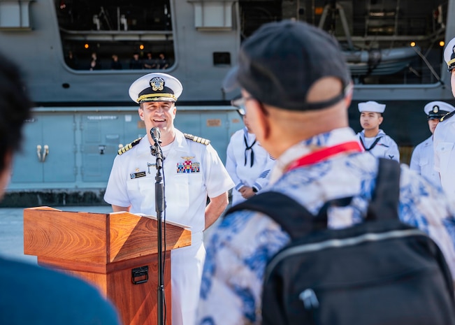 Capt. Nicholas DeLeo, commanding officer of Nimitz-class aircraft carrier USS George Washington (CVN 73) speaks to Gaum media pierside after arriving at Naval Station Guam, June 16, 2025. George Washington is the U.S. Navy’s premiere forward-deployed aircraft carrier, a long-standing symbol of the United States’ commitment to maintaining a free and open Indo-Pacific, while operating alongside allies and partners across the U.S. Navy’s largest numbered fleet. (U.S. Navy photo by Mass Communication Specialist 3rd Class Roselia Garcia)
