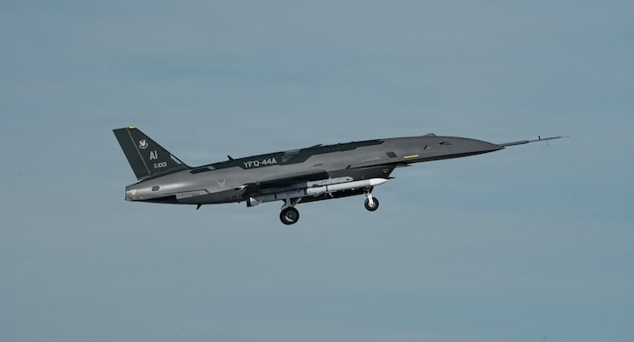 A YFQ-44A, part of the Air Force’s Collaborative Combat Aircraft (CCA) program, undergoes an undated captive carry test at a California test location. This test phase uses inert munitions to methodically validate weapons integration, structural performance and safety, ensuring the platform can safely carry external stores. The CCA program is a critical part of a larger, integrated system-of-systems designed to extend the reach and effectiveness of crewed aircraft, giving U.S. warfighters an overwhelming advantage in future conflicts. (Courtesy photo)