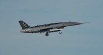 A YFQ-44A, part of the Air Force’s Collaborative Combat Aircraft (CCA) program, undergoes an undated captive carry test at a California test location. This test phase uses inert munitions to methodically validate weapons integration, structural performance and safety, ensuring the platform can safely carry external stores. The CCA program is a critical part of a larger, integrated system-of-systems designed to extend the reach and effectiveness of crewed aircraft, giving U.S. warfighters an overwhelming advantage in future conflicts. (Courtesy photo)