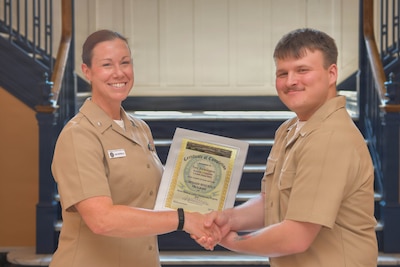 PORTSMOUTH, Va. (June 12, 2026) Corpsmen graduate from the Hospital Corpsman Residency Program (HMRP) at Naval Medical Center Portsmouth, June 12, 2026. NMRTC Portsmouth is the premier readiness and training platform that provides superior medical training for military medical service members at NMCP, the U.S. military’s oldest, continuously operating military hospital since 1830. (U.S. Navy photo by Mass Communication Specialist 1st Class Michael Botts)