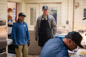 U.S. Air Force Col. Richard McElhaney, 374th Airlift Wing commander, speaks with a Rise and Grind staff member during an immersion at Yokota Air Base, Japan, June 17, 2026.
