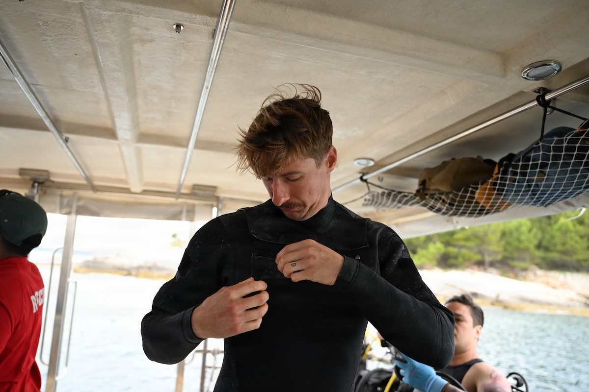 A U.S. Air Force pararescueman assigned to the 57th Rescue Squadron adjusts a wetsuit before a dive in Medulin, Croatia,June 10, 2026.
