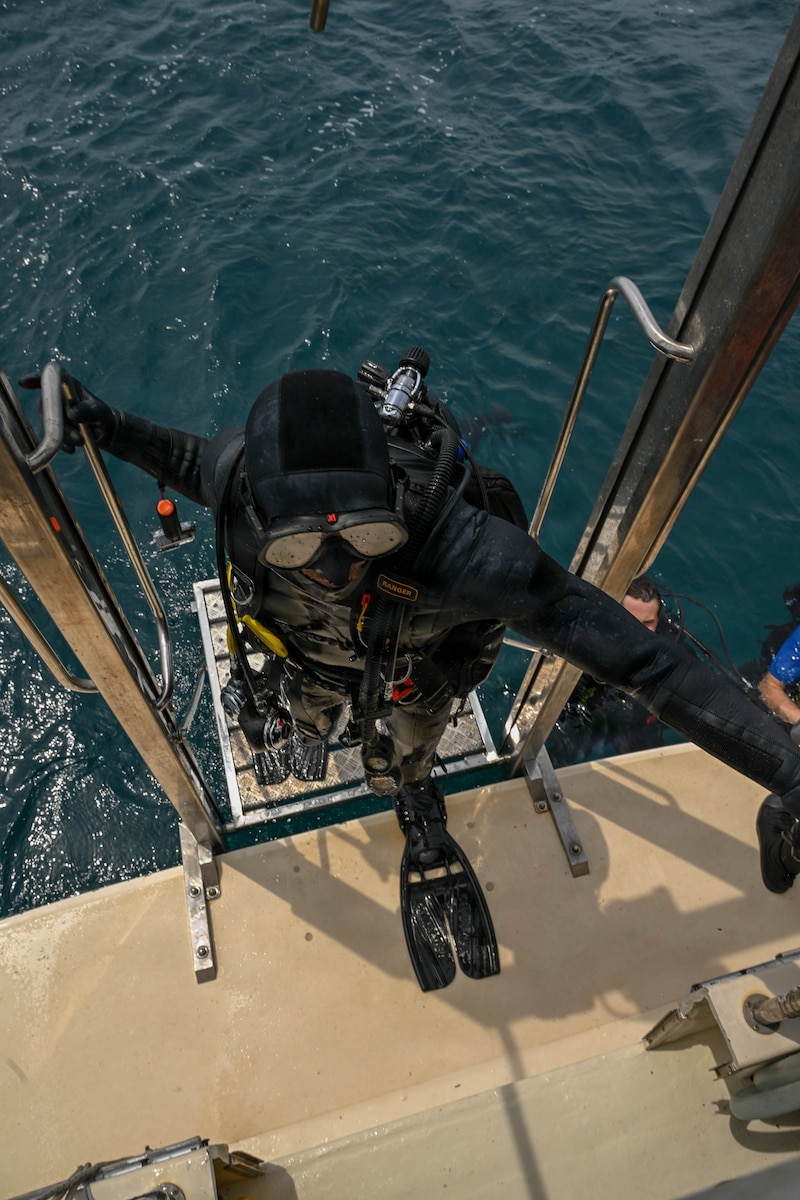 A U.S. Air Force pararescueman assigned to the 57th Rescue Squadron based out of Aviano Air Base, Italy, ascends using a dive elevator after completing a training dive in Medulin, Croatia, June 11, 2026.