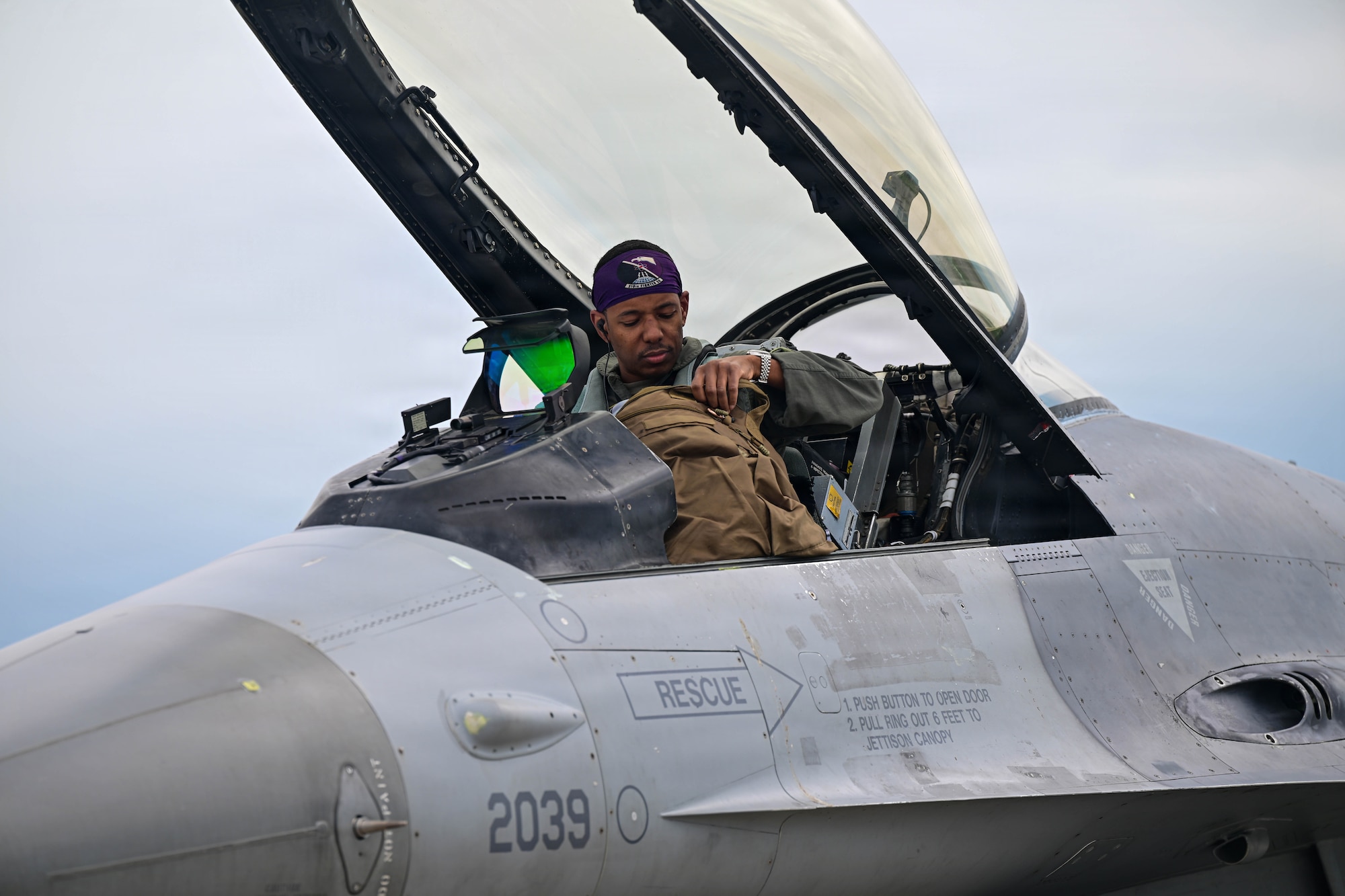 U.S. Air Force Maj. Andre Golson, 31st Operations Support Squadron weapons and tactics chief, prepares to exit an F-16 Fighting Falcon following his final flight at Aviano Air Base, Italy, June 3, 2026.