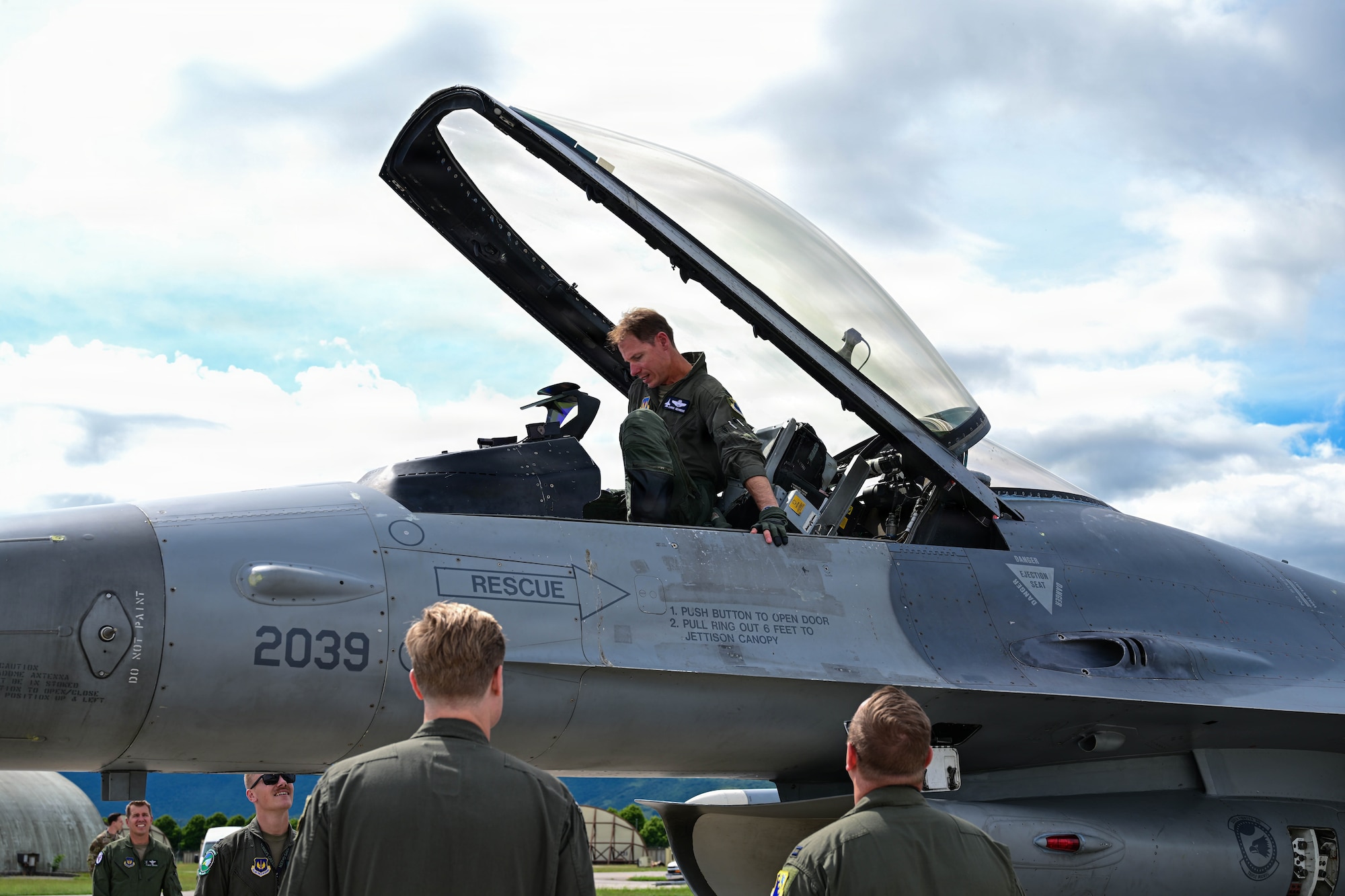 U.S. Air Force Lt. Col. Christopher Behrens, 31st Operations Group deputy commander, exits an F-16 Fighting Falcon following his final flight at Aviano Air Base, Italy, June 3, 2026.