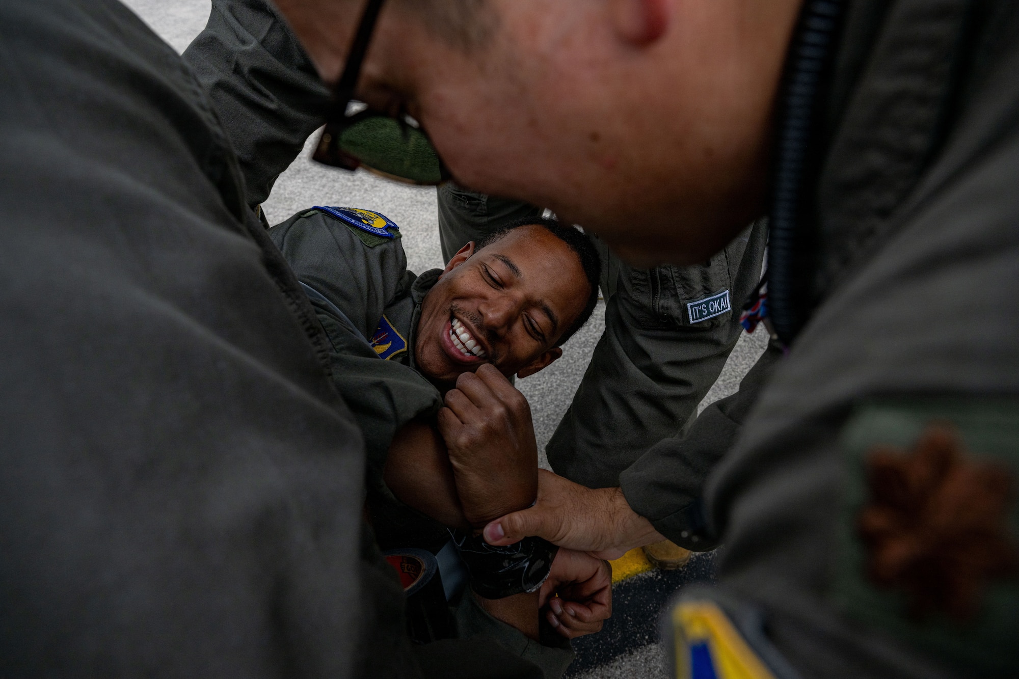 U.S. Air Force Maj. Andre Golson, 31st Operations Support Squadron weapons and tactics chief, celebrates with fellow pilots after his final flight at Aviano Air Base, Italy, June 3, 2026.
