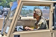 Spc. Andy Soto, a native of Havana, Cuba, automated logistical specialist, 873rd Quartermaster Company, 332nd Transportation Battalion, 143rd Sustainment Command (Expeditionary), watches carefully as he delivers pallets of food and water for Soldiers participating in Operation Sentinel Justice, Camp Shelby, Miss., June 11. (Photo by Maj. Alun Thomas, 377th Theater Sustainment Command Public Affairs)