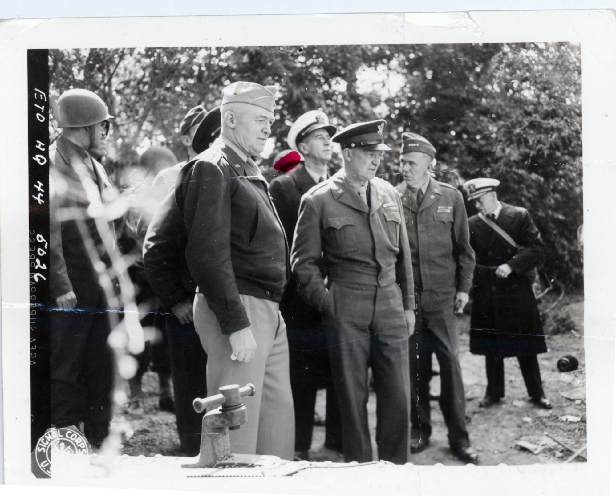 Maj. Gen. Henry Arnold, with Admiral Ernest King, Gen. Dwight Eisenhower, and Gen. George Marshall tour Normandy, France on June 12, 1944.