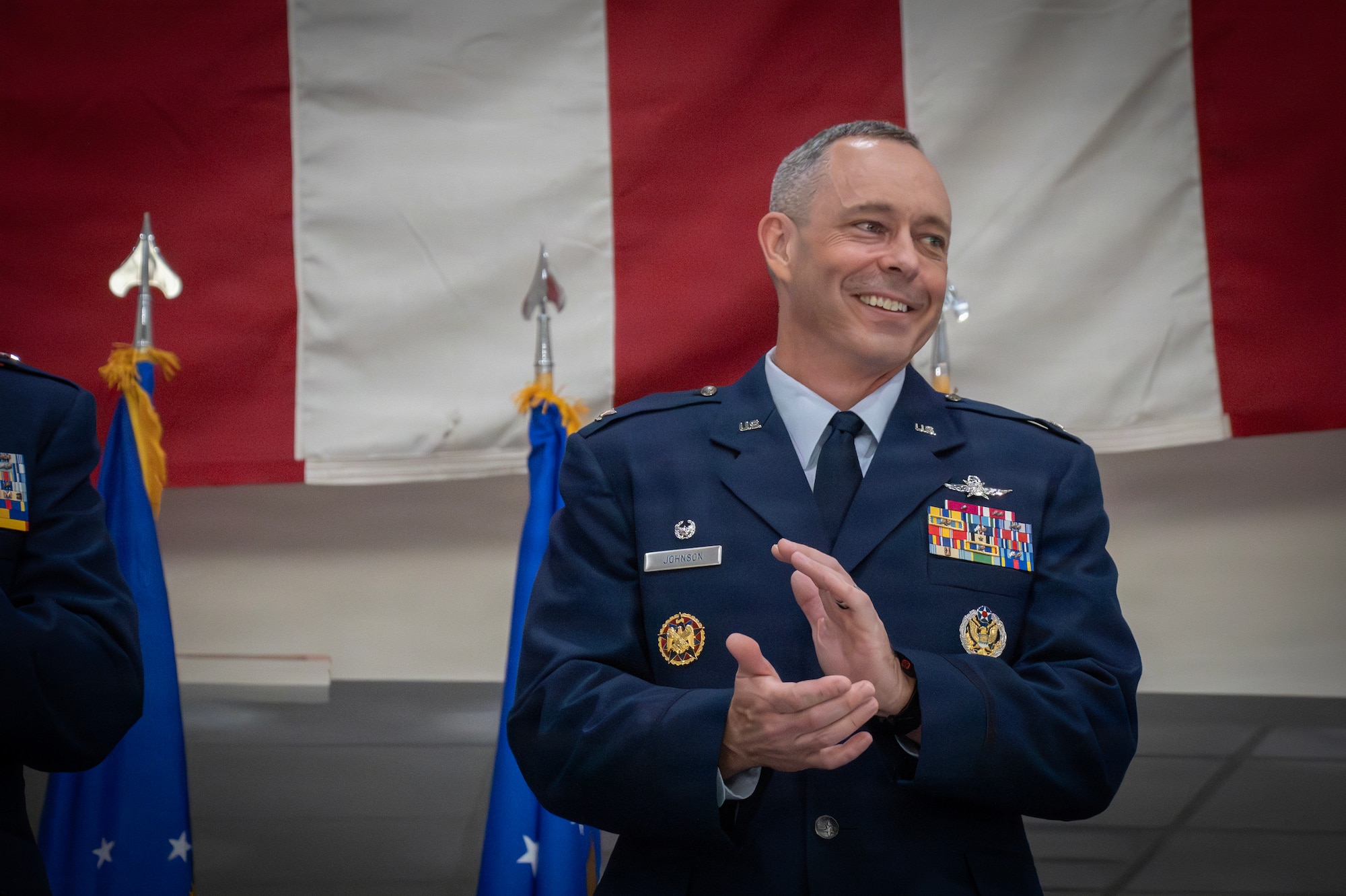 Col. Darren E. Hamilton relinquishes command of the 179th Cyberspace wing to incoming commander Col. Jack W. Johnson at the 179th Cyberspace Wing, Mansfield, Ohio, June 6, 2026. The 179th provides cyber-enabled capabilities supporting tactical needs in air superiority and information warfare, providing a competitive advantage in combat performance and survivability in joint force operations. (U.S. Air force photo by Tech Sgt. Alyssa Reik)