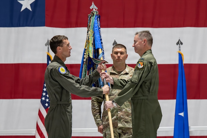 Man holding Guidon
