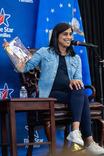 The Second Lady of the United States, Usha Vance, displays illustrations from a book while reading to military-connected children and their families during a Blue Star Books event at MacDill Air Force Base, Florida, June 16, 2026. The event supported Vance’s 2026 Summer Reading Challenge, which encourages children to read in celebration of America’s 250th anniversary. (U.S. Air Force photo by Airman 1st Class Nelvis Sera)