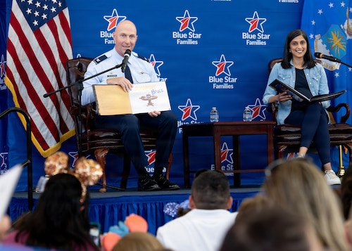 U.S. Air Force Col. Edward Szczepanik, 6th Air Refueling Wing Commander, and the Second Lady of the United States, Usha Vance, read to military-connected children and their families during a Blue Star Books event at MacDill Air Force Base, Florida, June 16, 2026. 125 children of military members received books during the event in support of the Second Lady’s 2026 Summer Reading Challenge. (U.S. Air Force photo by Airman 1st Class Nelvis Sera)