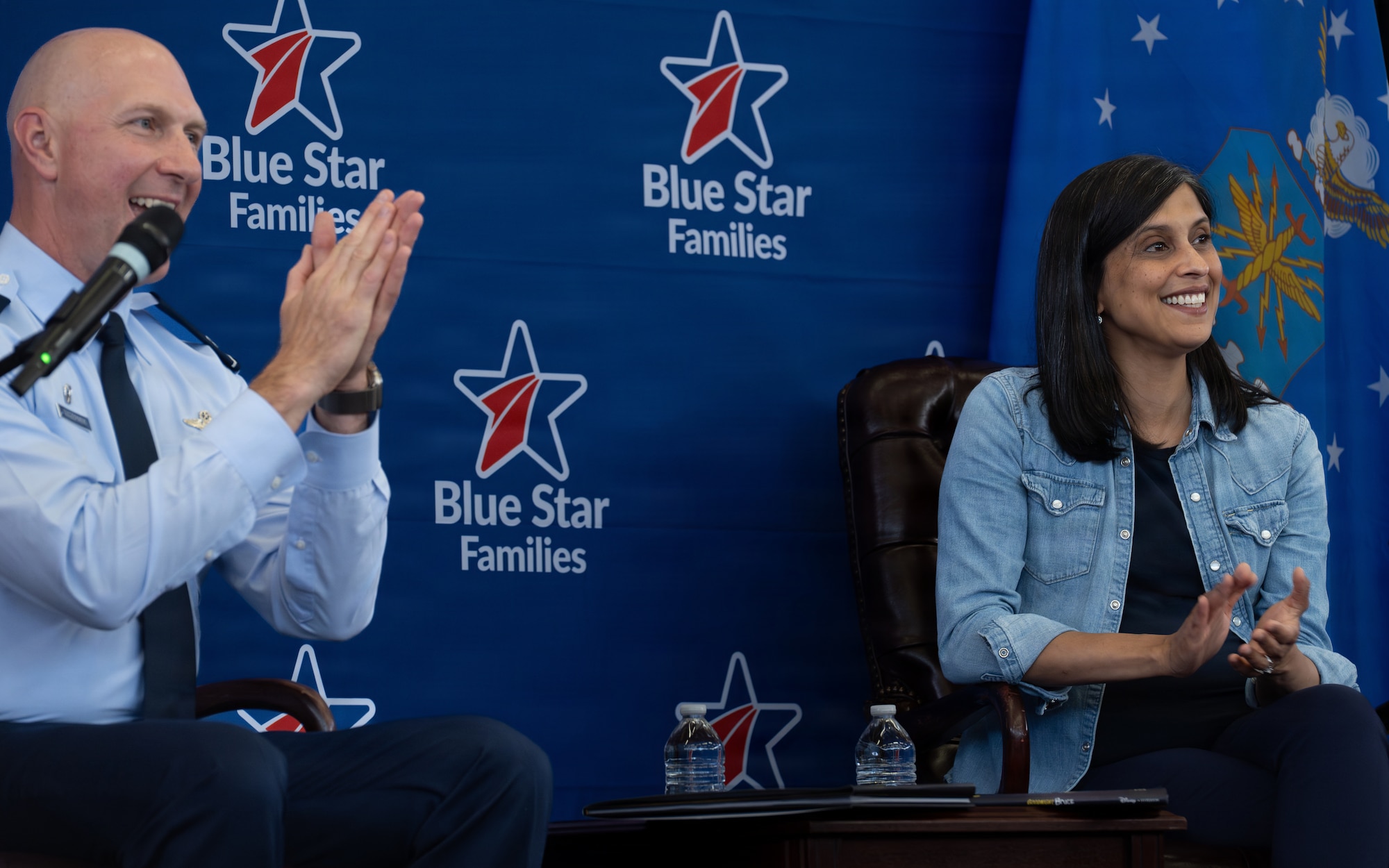 The Second Lady of the United States,Usha Vance, claps alongside U.S. Air Force Col. Edward Szczepanik, 6th Air Refueling Wing Commander, during a Blue Star Books event at MacDill Air Force Base, Florida, June 16, 2026. Hosted by Blue Star Families in collaboration with The Walt Disney Company, the event supported Vance’s 2026 Summer Reading Challenge. (U.S. Air Force photo by Airman 1st Class Nelvis Sera)