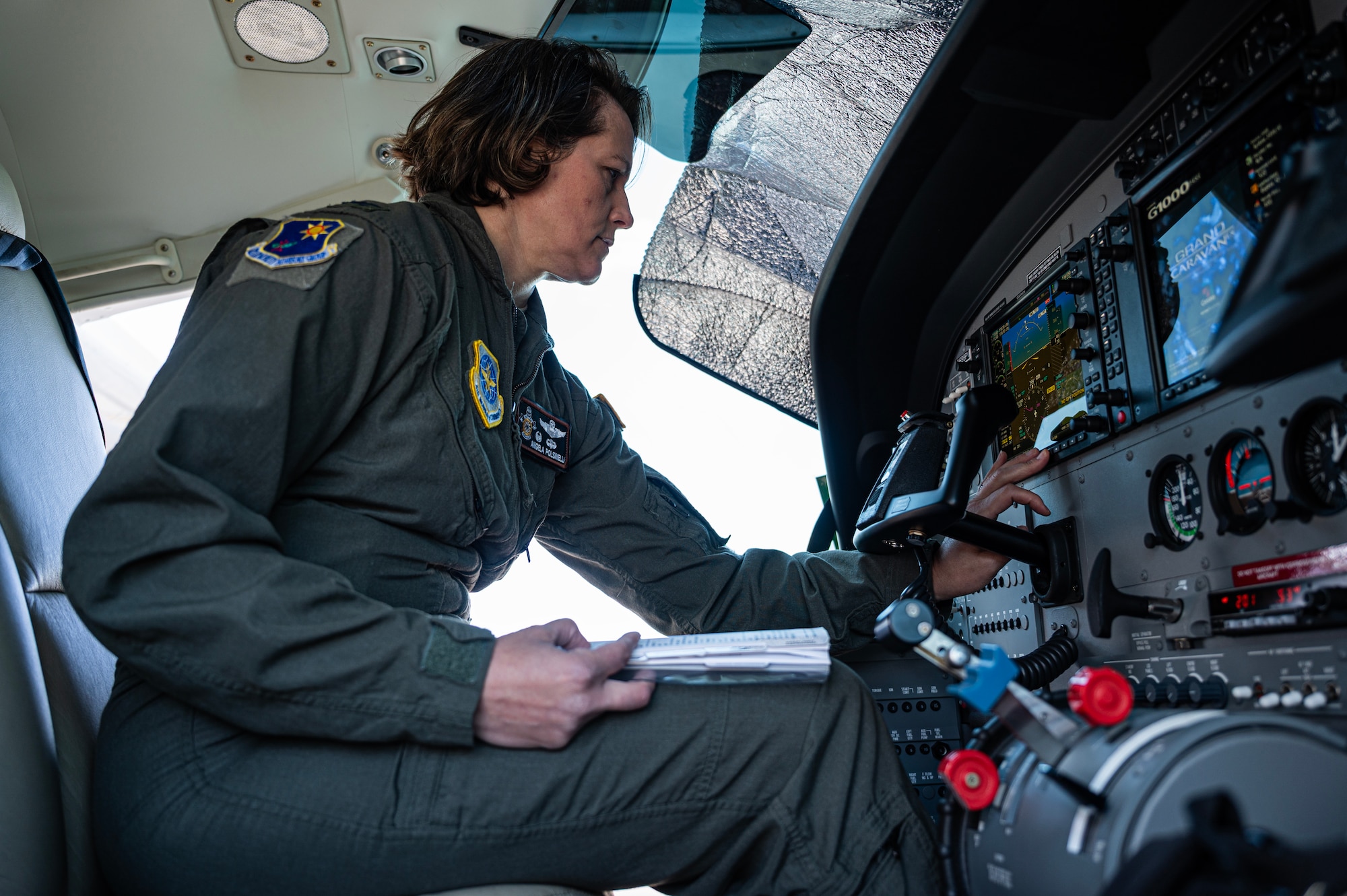 Woman prepares aircraft for flight.