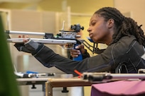 U.S. Army 1st Lt. Jani Merritt aims downrange during a precision air training session at the 2026 Warrior Games Training Camp in San Antonio.