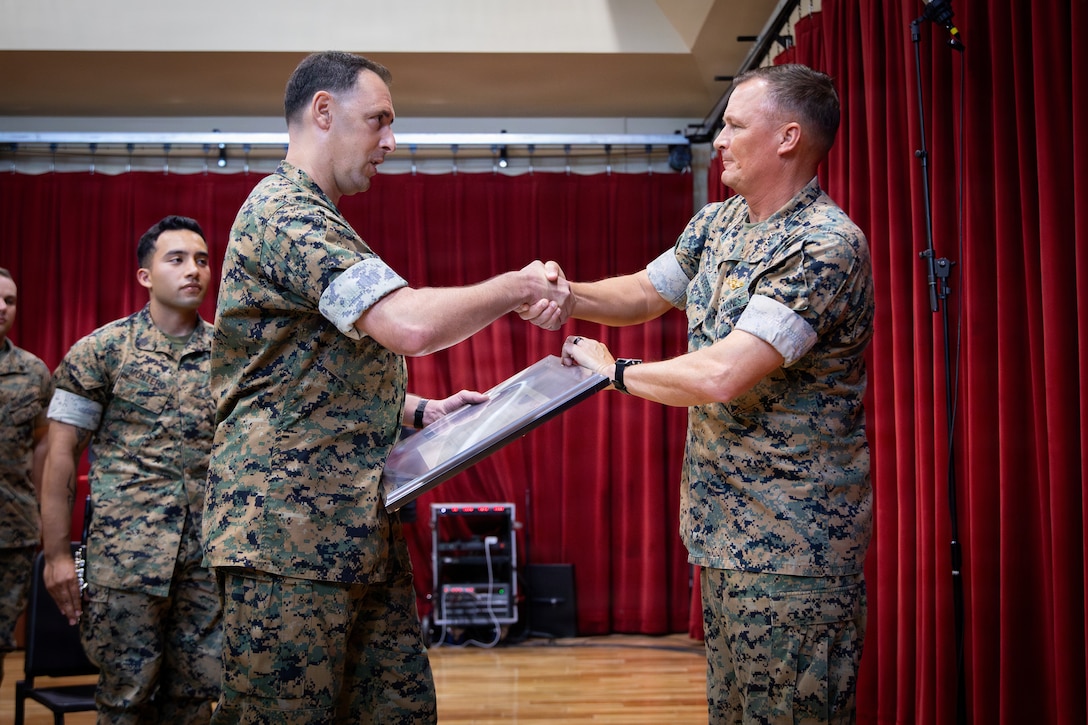U.S. Marine Corps Sgt. Weston W. McCall, a french horn instrumentalist with Marine Forces Reserve Band, performs during an award ceremony held for the Marine Forces Reserve Band at Marine Forces Support Facility New Orleans, June 4, 2026. Each year only a select few military bands are presented with the Colonel George S. Howard Citation of Musical Excellence award, the highest honor a military concert band can receive. (U.S. Marine Corps photo by Lance Cpl. Nalanie Davila)
