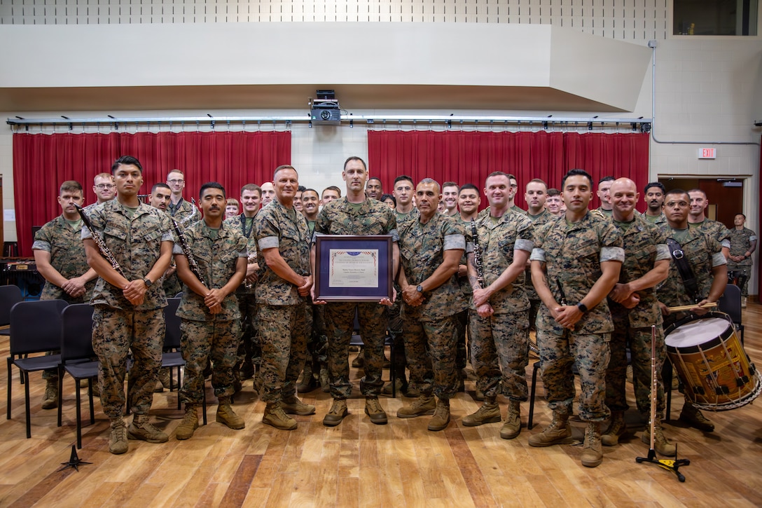 U.S. Marine Corps Sgt. Weston W. McCall, a french horn instrumentalist with Marine Forces Reserve Band, performs during an award ceremony held for the Marine Forces Reserve Band at Marine Forces Support Facility New Orleans, June 4, 2026. Each year only a select few military bands are presented with the Colonel George S. Howard Citation of Musical Excellence award, the highest honor a military concert band can receive. (U.S. Marine Corps photo by Lance Cpl. Nalanie Davila)