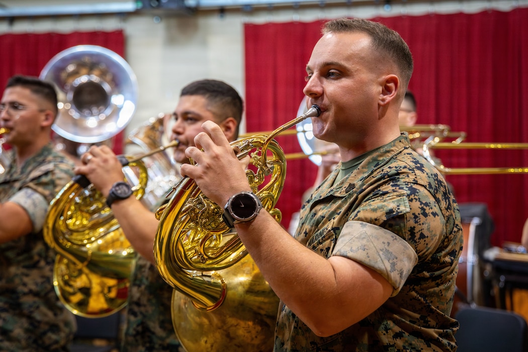 U.S. Marine Corps Sgt. Weston W. McCall, a french horn instrumentalist with Marine Forces Reserve Band, performs during an award ceremony held for the Marine Forces Reserve Band at Marine Forces Support Facility New Orleans, June 4, 2026. Each year only a select few military bands are presented with the Colonel George S. Howard Citation of Musical Excellence award, the highest honor a military concert band can receive. (U.S. Marine Corps photo by Lance Cpl. Nalanie Davila)