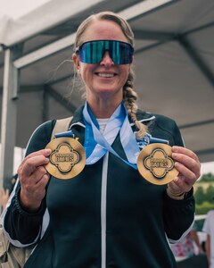 U.S. Army Maj. Mandy Feindt displays her gold medals after the cycling event during the 2026 Warrior Games in San Antonio.