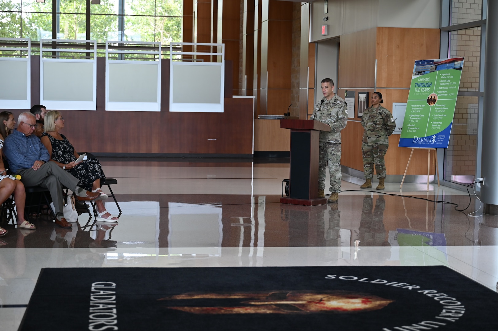 Col. Mark Jacques, commander of Carl R. Darnall Army Medical Center, speaks during the Soldier Recovery Unit change of command ceremony at Fort Hood. Jacques recognized outgoing commander Lt. Col. John Burns for his leadership and welcomed Lt. Col. Michael Finch to the unit.