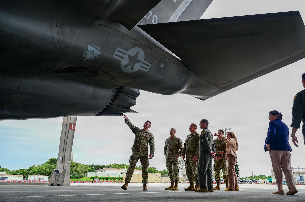 Chief Master Sgt. of the Space Force John Bentivegna, second from left, views a static display of a U.S. Air Force F-35A Lightning II assigned to the 4th Expeditionary Fighter Squadron deployed to Kadena Air Base, Japan, June 12, 2026. The display highlighted the 18th Wing's capabilities and its role in sustaining joint force operations throughout the Indo-Pacific. (U.S. Air Force photo by Airman 1st Class Gracelyn Hess)