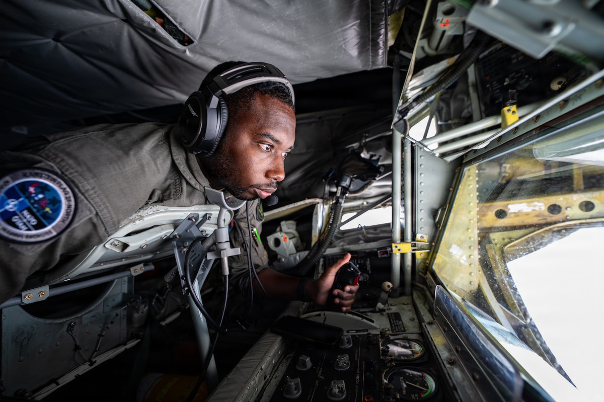 U.S. Air Force Staff Sgt. Mendè Lahens, 351st Air Refueling Squadron boom operator, performs refueling operations in the boom pod of a 100th Air Refueling Wing KC-135 Stratotanker during Ramstein Flag 26 over Sweden, June 10, 2026. Aerial refueling extends the range and endurance of participating aircraft, supporting NATO Allied Air Command training objectives throughout RAFL26. (U.S. Air Force photo by Senior Airman Aidan Martínez Rosiere)