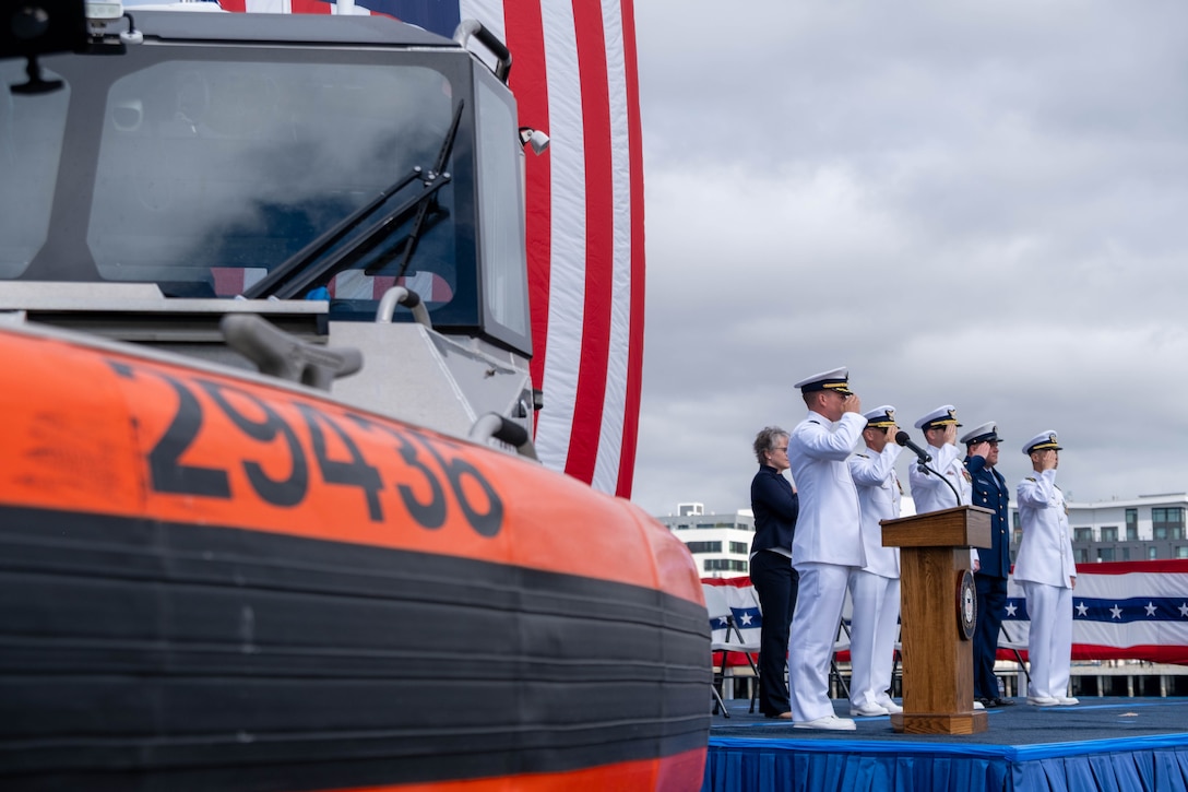 Official party salutes during Base Alameda change of command ceremony.