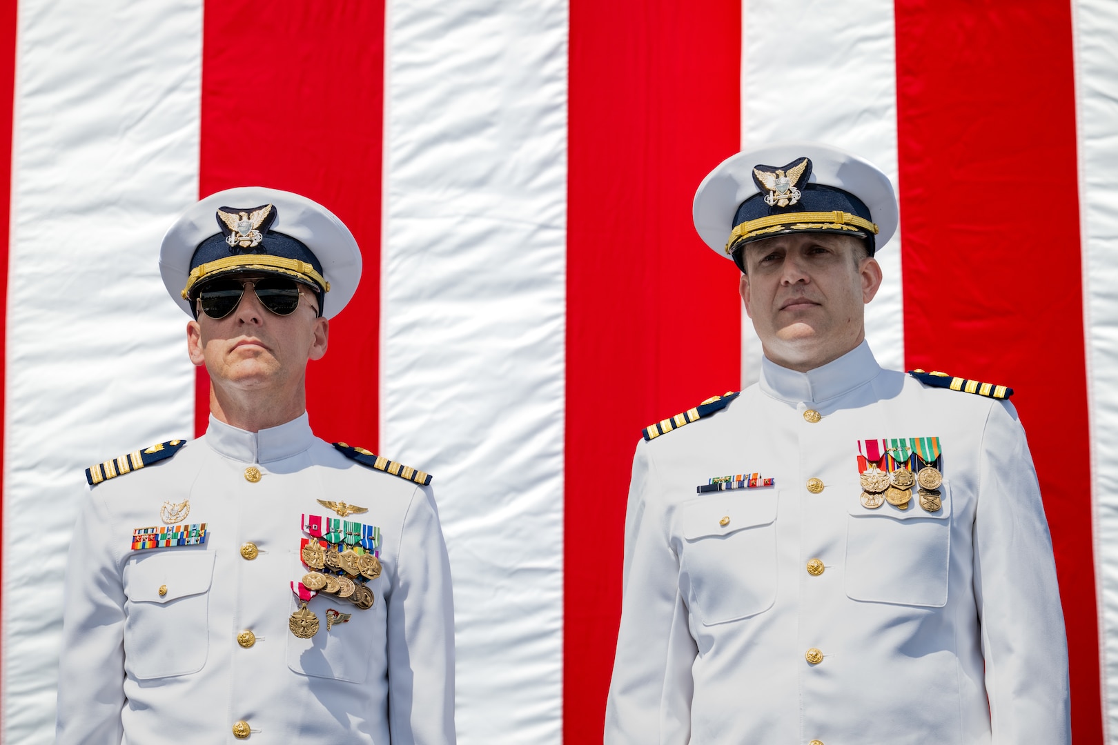 Capt. Corey Braddock stands beside Capt. Joseph Graham